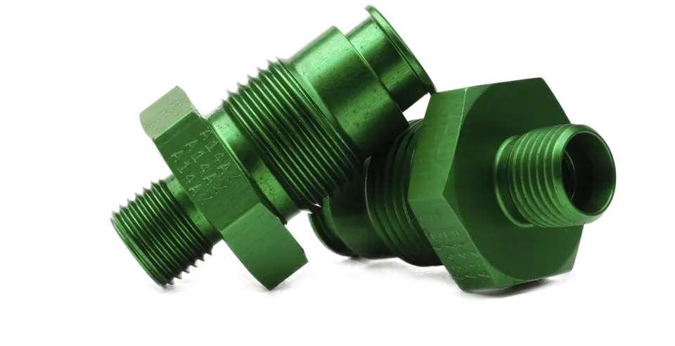 Green anodised CNC-turned aluminium fittings made by FastFab